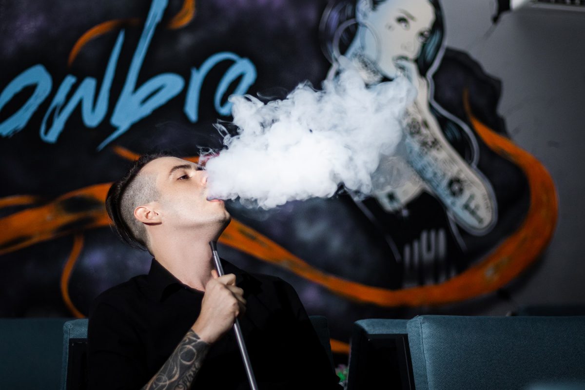 Man Smoking Vape - Exhaling Vapour