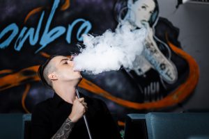 Man Smoking Vape - Exhaling Vapour